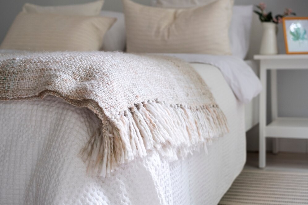 bed-arrangement-with-fresh-sheets_23-2150551109