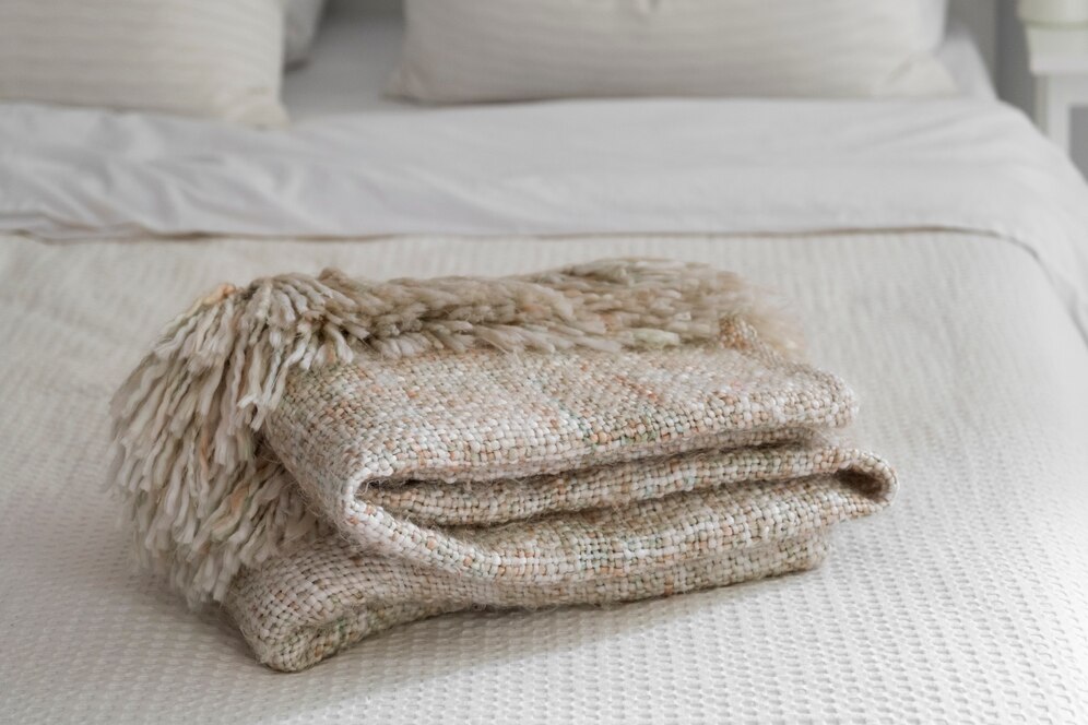 bed-arrangement-with-fresh-sheets_23-2150551110